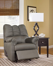 Ashley Furniture Darcy living room set with sofa and loveseat in a modern design, shown in a spacious living area.