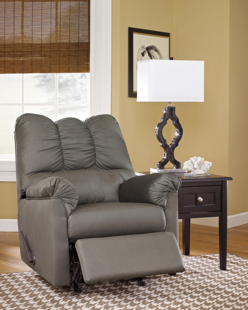 Ashley Furniture Darcy living room set with sofa and loveseat in a modern design, shown in a spacious living area.