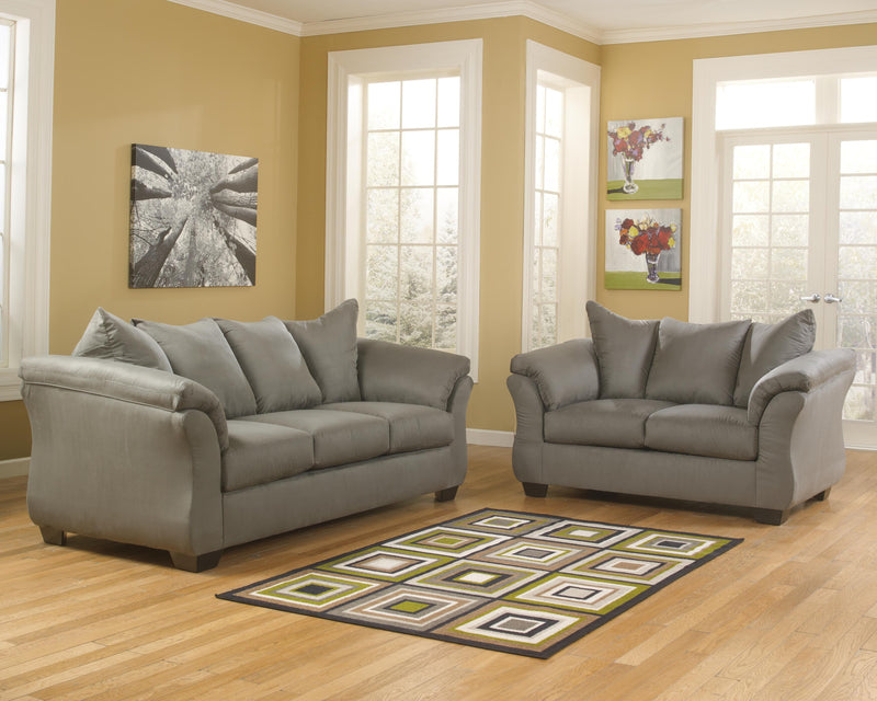 Ashley Furniture Darcy living room set featuring a plush sofa and matching chairs with neutral fabric and modern design.
