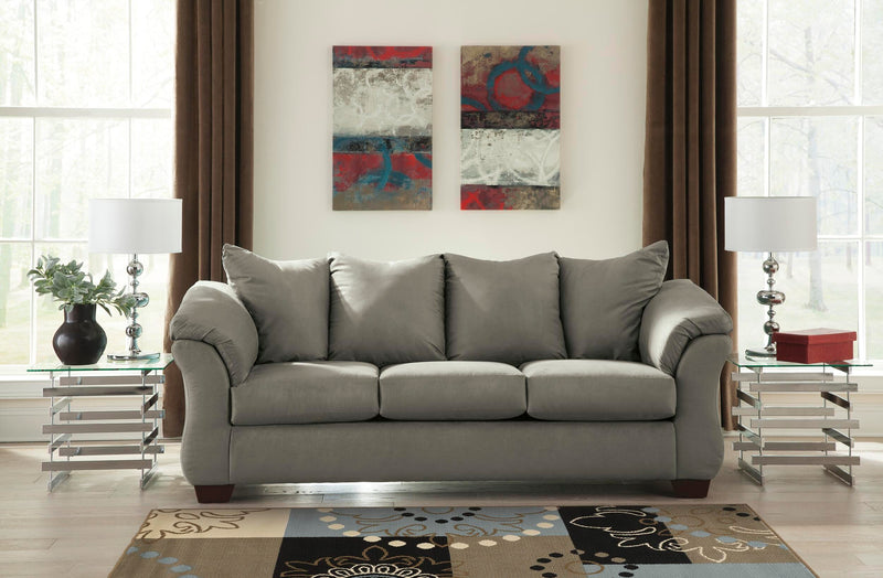 Ashley Furniture Darcy living room set with sofa and armchair, featuring neutral upholstery and modern design.