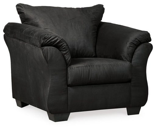 Ashley Furniture Darcy Chair with plush fabric upholstery and wooden legs, showcasing a stylish and comfortable living room seating option.