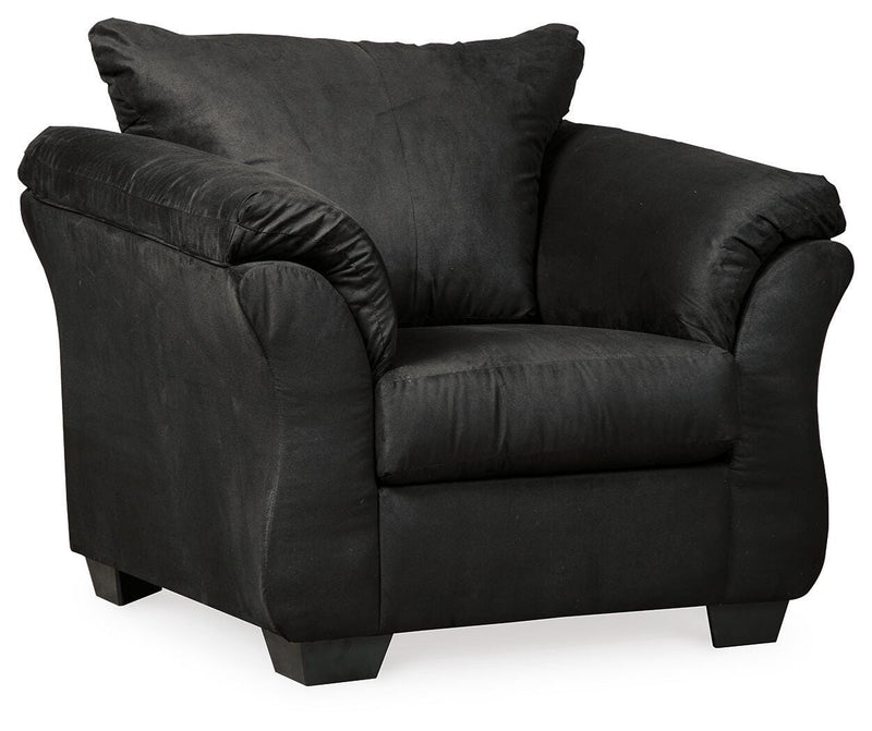 Ashley Furniture Darcy living room set featuring a sofa and loveseat with neutral upholstery and wooden legs.