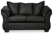 Ashley Furniture Darcy living room set with plush sofa and matching armchair in a modern design, shown in a stylish living room setting.