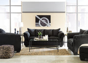 Ashley Furniture Darcy living room set with sofa and armchair in a modern design, featuring neutral fabric upholstery.