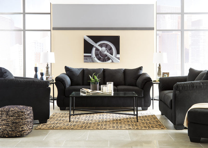 Ashley Furniture Darcy living room set with sofa and armchair in a modern design, featuring neutral fabric upholstery.