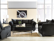 Ashley Furniture Darcy living room set with sofa and armchair in a modern fabric, arranged in a cozy, stylish living space.