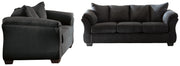 Ashley Furniture Darcy living room set with a sofa and armchair, featuring neutral upholstery and modern design.