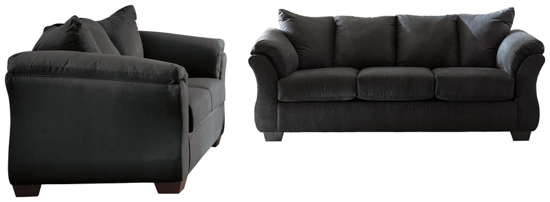 Ashley Furniture Darcy living room set with a sofa and armchair, featuring neutral upholstery and modern design.