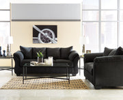 Ashley Furniture Darcy living room set includes a sofa and loveseat with neutral fabric upholstery and modern design.