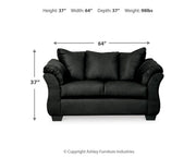 Ashley Furniture Darcy Living Room Set with plush sofa and matching armchair in a modern design, shown in a stylish living space.
