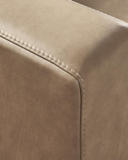 Ashley Furniture Veronella sectional with chaise, showing plush fabric upholstery and modern design with sectional and chaise features.