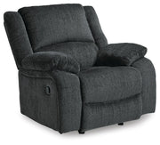 Ashley Furniture Draycoll recliner in a closed position, showcasing plush fabric upholstery and stylish design from an angled view.