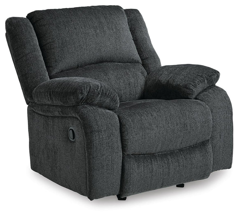 Ashley Furniture Draycoll recliner in a closed position, showcasing plush fabric upholstery and stylish design from an angled view.
