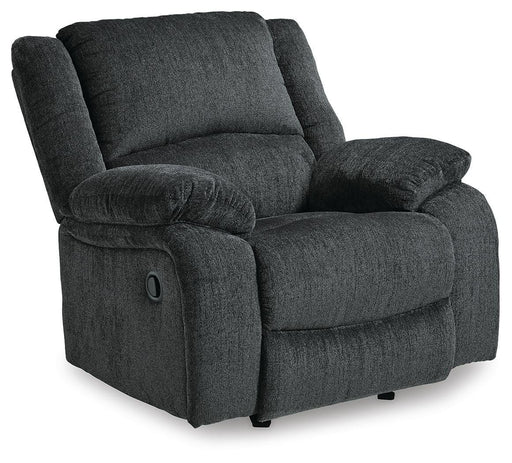 Ashley Furniture Draycoll recliner in a closed position, showcasing plush fabric upholstery and stylish design from an angled view.