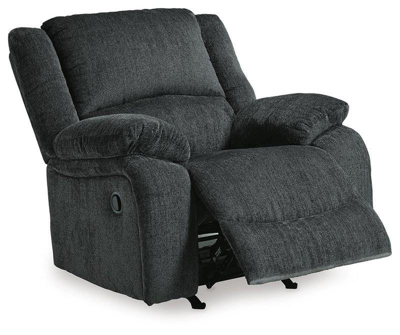Open-angle view of Ashley Furniture Draycoll recliner with plush cushioning and dark brown leather upholstery.