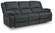 Ashley Furniture Draycoll power reclining sofa in a closed angle view, showcasing its plush fabric and sleek design.