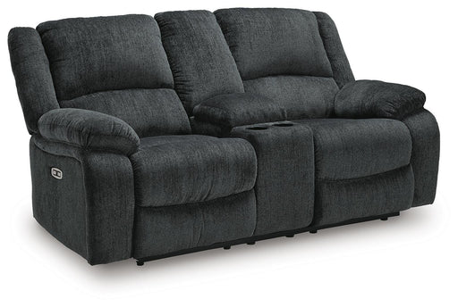 Ashley Furniture Draycoll power reclining loveseat with console, featuring plush upholstery and a modern design, shown from an angled view.