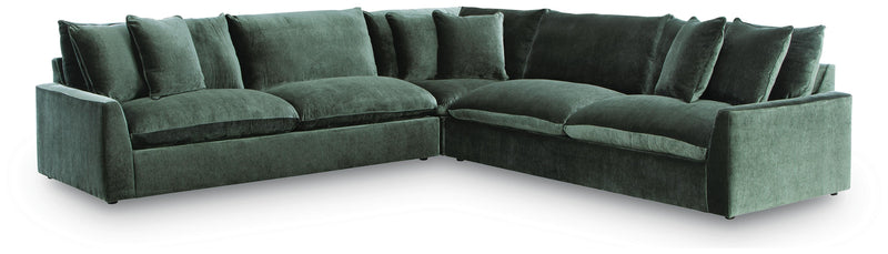 Ashley Furniture Carriage View Sectional sofa with beige upholstery and multiple cushions, shown in a modern living room setting.