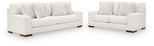 Ashley Furniture Hartside living room set with sofa and armchair in a modern design, shown in a cozy, stylish living room.