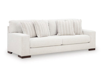 Ashley Furniture Hartside living room set featuring a sofa and armchair in a modern design, shown from an angled view.