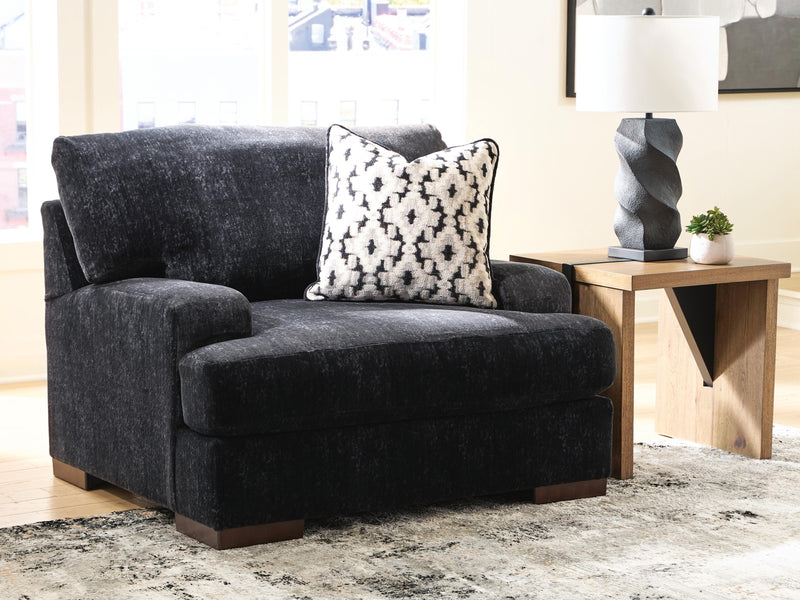 Ashley Furniture Whitmore Manor oversized chair with plush fabric and wide armrests, perfect for a living room or lounge space.
