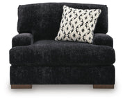 Ashley Furniture Whitmore Manor oversized chair with plush upholstery and cushioned armrests, shown from a front head-on view.