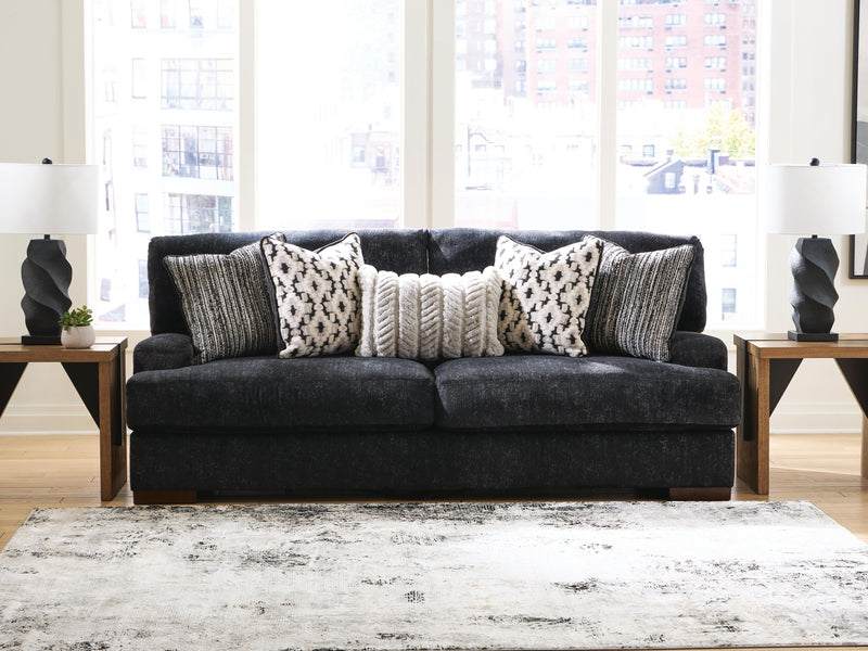 Ashley Furniture Whitmore Manor sofa with plush upholstery and elegant design, shown in a stylish living room setting.