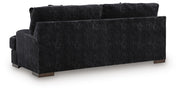 Ashley Furniture Whitmore Manor sofa with plush fabric and classic design, shown from the back angle.