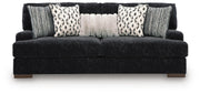 Ashley Furniture Whitmore Manor sofa with plush cushions and elegant design, shown from a head-on perspective.