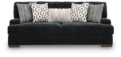 Ashley Furniture Whitmore Manor sofa with plush cushions and elegant design, shown from a head-on perspective.
