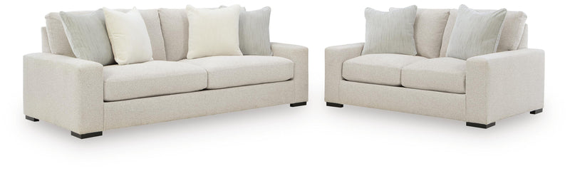 Ashley Furniture Conlee-Pike living room set with sofa and loveseat in a modern design, featuring neutral upholstery.