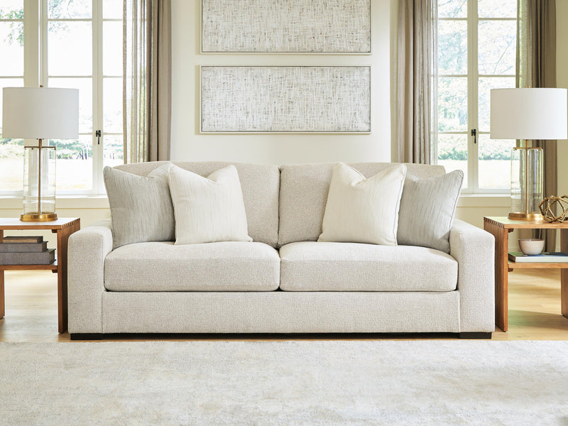 Ashley Furniture Conlee-Pike living room set featuring a sofa and armchair with neutral upholstery and modern design.