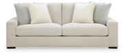 Ashley Furniture Conlee-Pike living room set with plush sofa and armchair, featuring neutral upholstery and modern design.