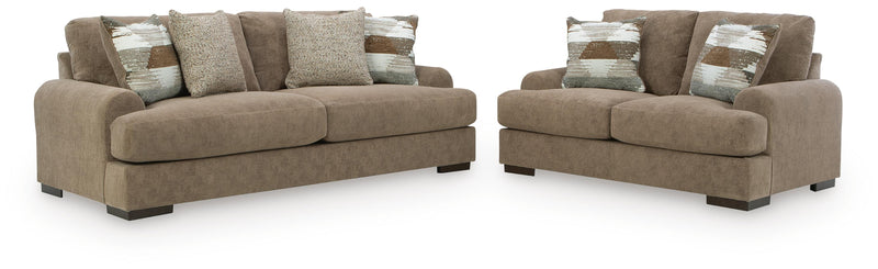 Ashley Furniture Jayne Park living room set with sofa and loveseat in neutral fabric, contemporary design with plush cushions.