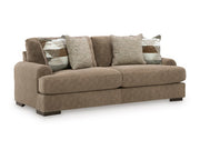 Ashley Furniture Jayne Park living room set with a sectional sofa and coordinating chairs, shown from an angled view in a modern living space.