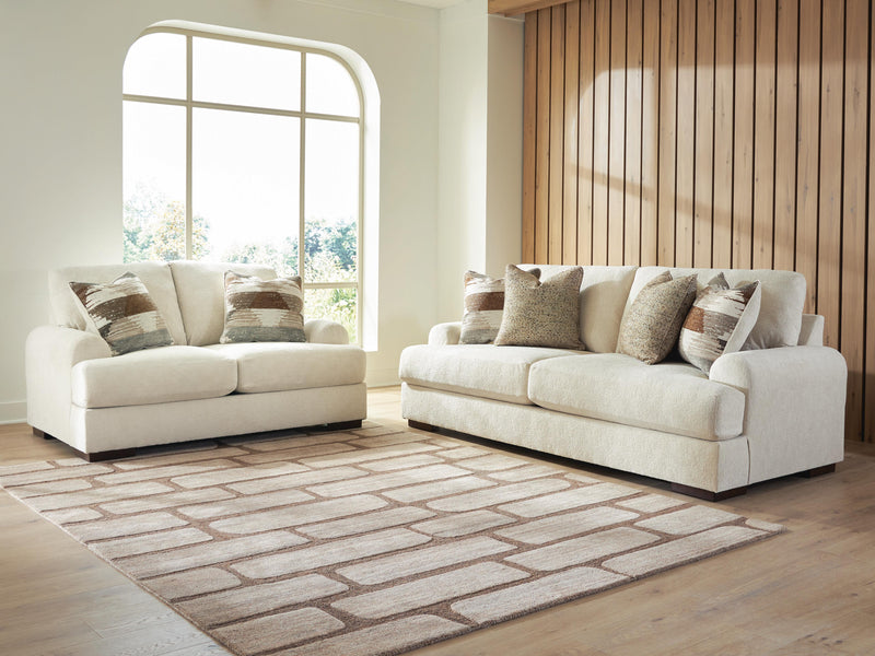 Ashley Furniture Jayne Park living room set with sofa and armchair, showcasing plush upholstery and modern design.