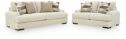 Ashley Furniture Jayne Park living room set with sofa and loveseat, featuring neutral upholstery and modern design.