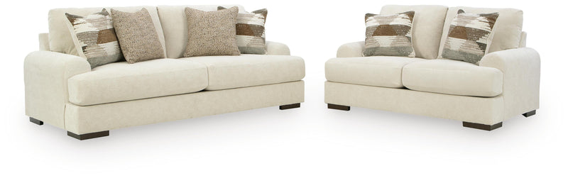 Ashley Furniture Jayne Park living room set with sofa and loveseat, featuring neutral upholstery and modern design.