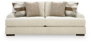 Ashley Furniture Jayne Park living room set featuring a sofa and loveseat with neutral upholstery and modern design.