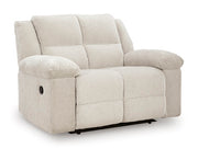 Ashley Furniture Orlen oversized recliner in neutral fabric, shown from an angled closed position with plush cushioning.