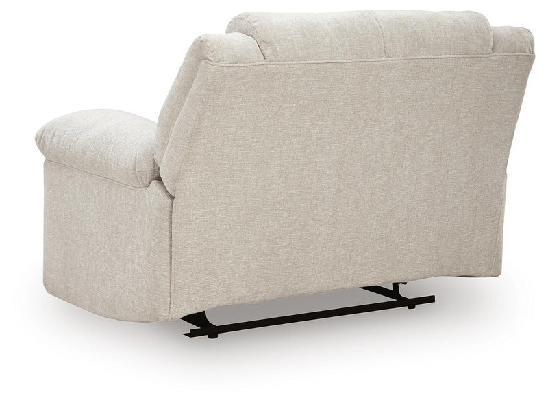 Ashley Furniture Orlen oversized recliner with plush backrest and padded armrests, shown from the back in a cozy living room setting.