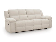 Ashley Furniture Orlen reclining sofa in a close-up side angle showing plush cushions and reclining mechanism.