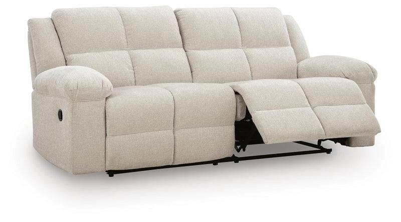 Ashley Furniture Orlen reclining sofa shown from an angled open view, featuring plush cushions and a stylish, modern design.