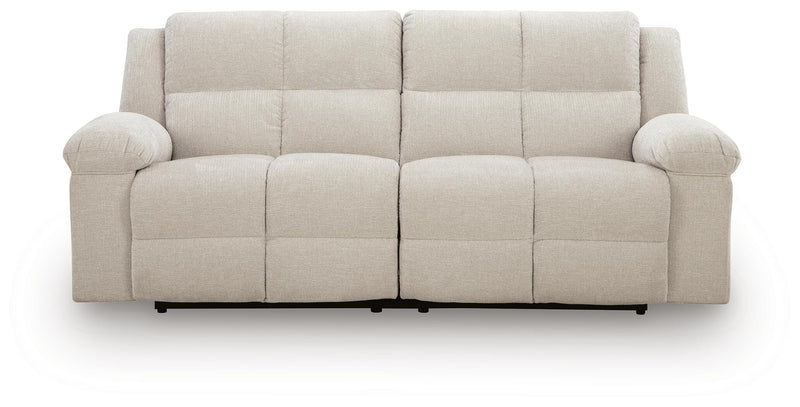 Ashley Furniture Orlen reclining sofa shown from head-on, featuring plush cushions and a modern design in a neutral fabric.