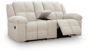 Ashley Furniture Orlen reclining loveseat with console, shown from an open angle, featuring plush upholstery and built-in cup holders.