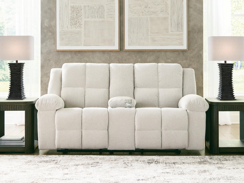Ashley Furniture Orlen reclining loveseat with console, featuring plush fabric, padded armrests, and built-in center console.