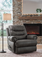 Ashley Furniture power lift recliner in closed position, featuring plush upholstery and a sturdy frame for comfort and support.