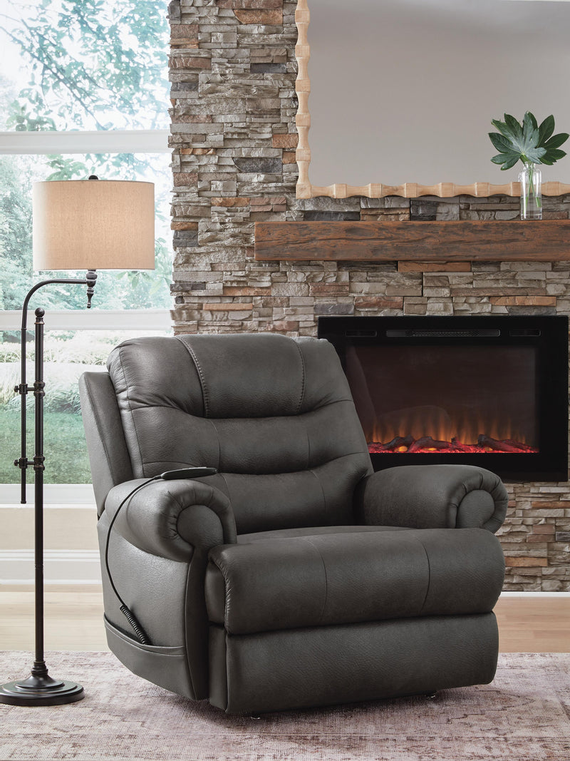 Ashley Furniture power lift recliner in closed position, featuring plush upholstery and a sturdy frame for comfort and support.