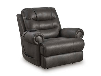Ashley Furniture power lift recliner in closed position, featuring plush upholstery and supportive design for comfort and ease of use.
