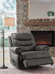 Ashley Furniture power lift recliner in open position, showing plush upholstery and ergonomic design for comfort and support.